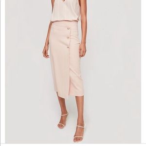 Babaton Billy Skirt in pink/cream from Aritzia